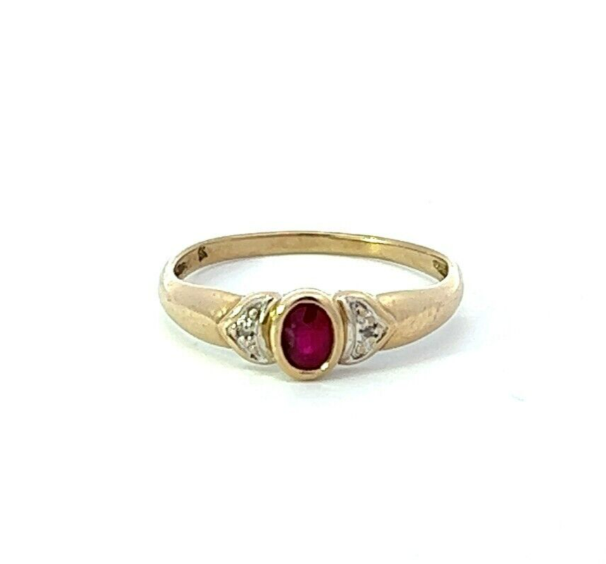 9Ct Yellow Gold Created Ruby and Diamond Accent Ring