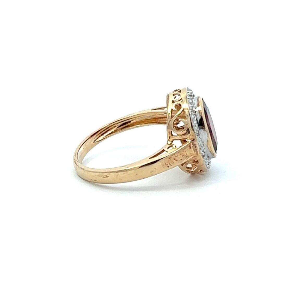 9Ct Yellow Gold Red Gemstone & Diamond Ring