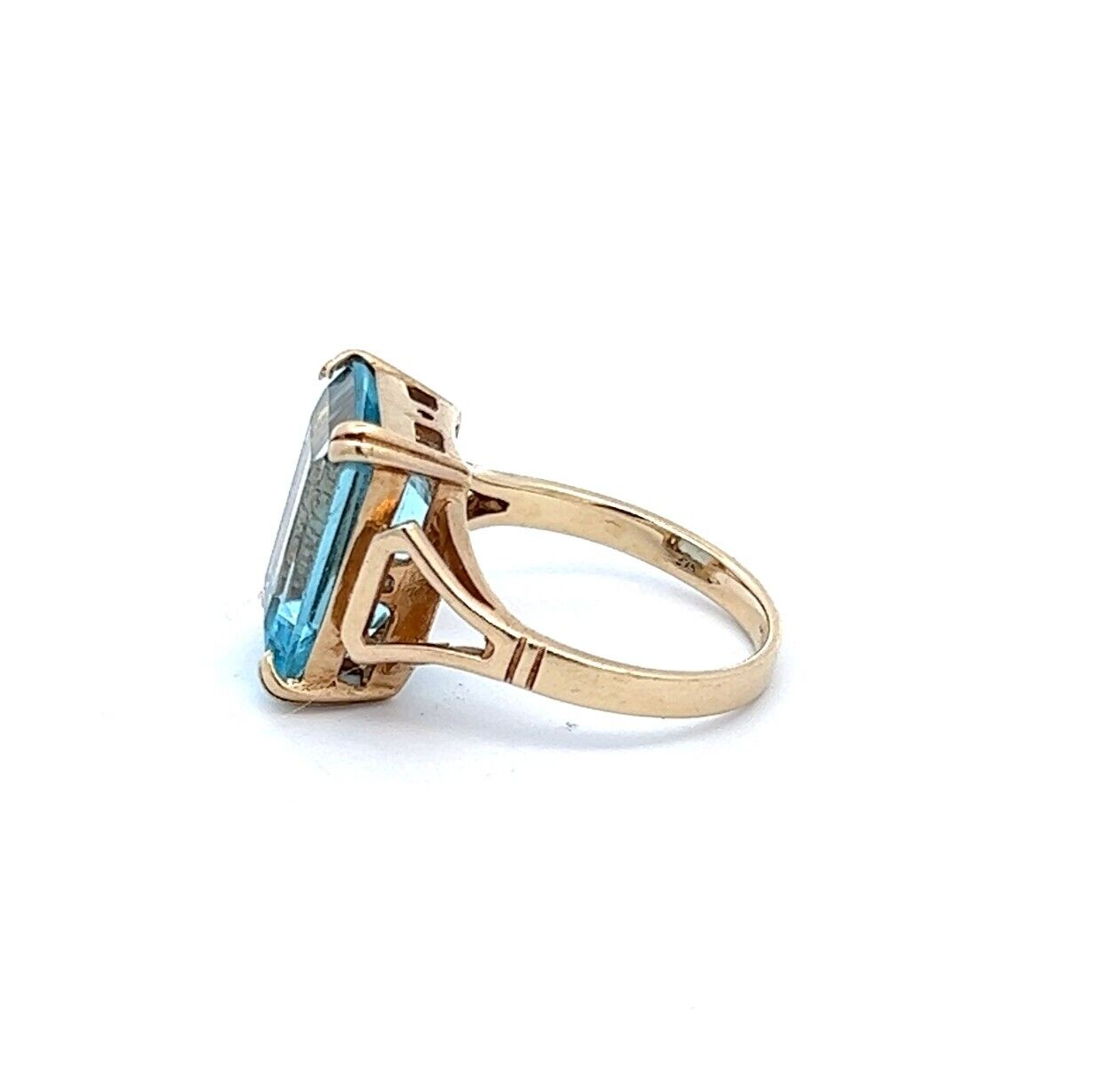 9Ct Yellow Gold Emerald Cut Blue Topaz Ring