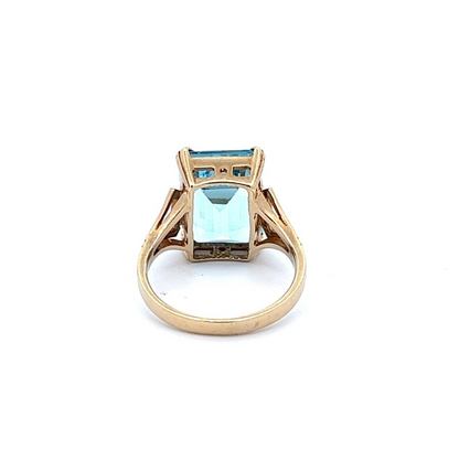 9Ct Yellow Gold Emerald Cut Blue Topaz Ring