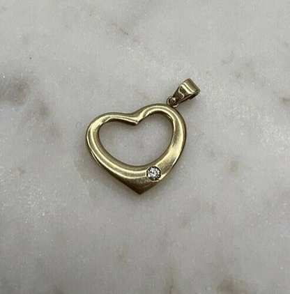 9Ct Yellow Gold .06 TW Diamond Heart Charm Pendant