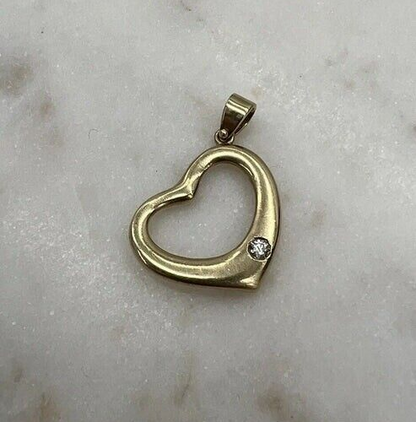 9Ct Yellow Gold .06 TW Diamond Heart Charm Pendant